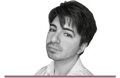 Adam Barnett: A black and white headshot of the author