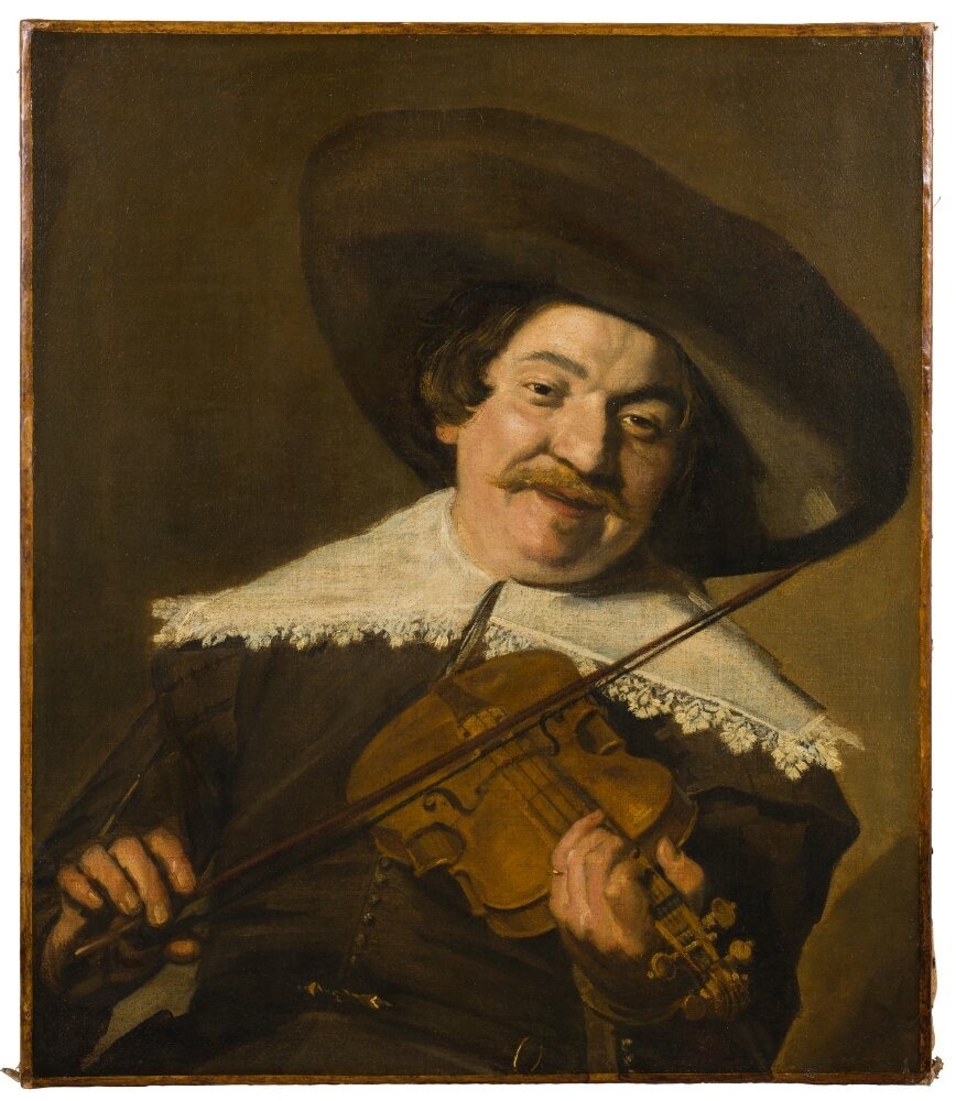 A portrait of Daniel van Aken playing the violin by Frans Hals