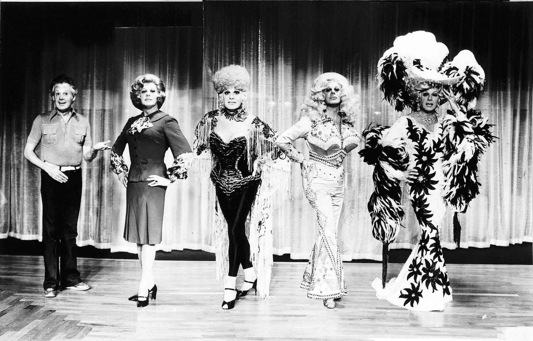 Danny La Rue dressed as Margaret Thatcher, Bette Midler, Dolly Parton and Mae West