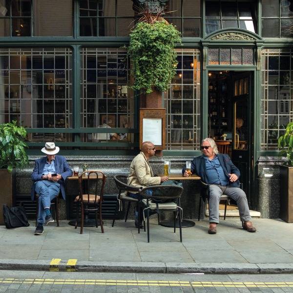 Patrons outside a pub in the Yorkshire Dales