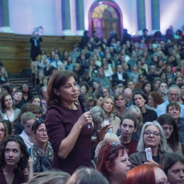 Natasha Walter speaks into a microphone