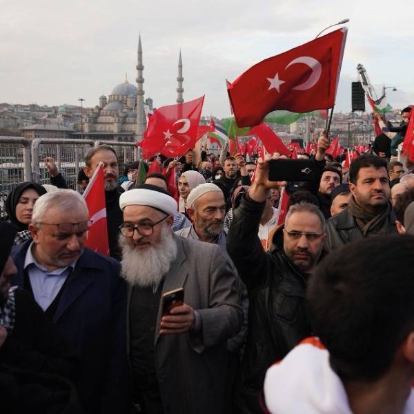 Crowds of protestors waving Palestinian and Turkish flags march in central Istanbul, January 2024