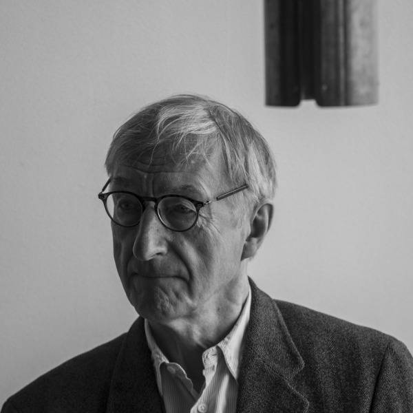 A black and white headshot of Julian Barnes