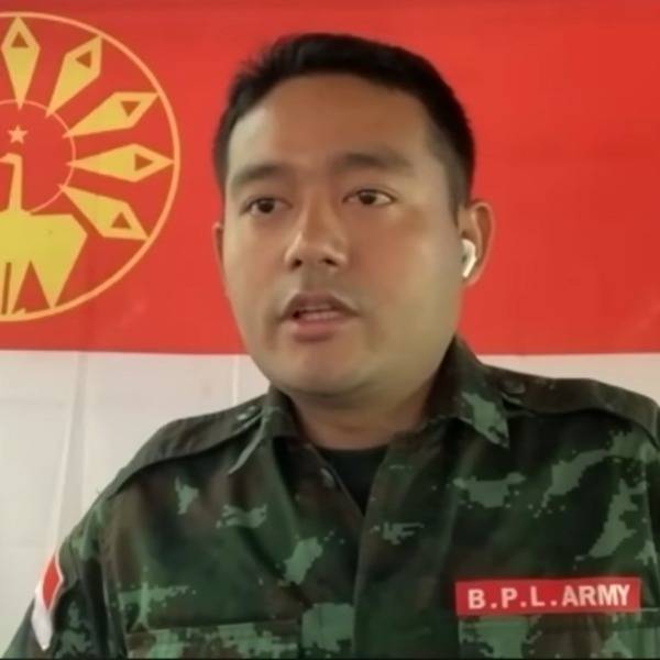 Poet Maung Saungkha dressed in military fatigues
