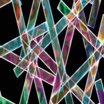 A decorative image shows shards of multi-coloured glass