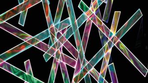 A decorative image shows shards of multi-coloured glass