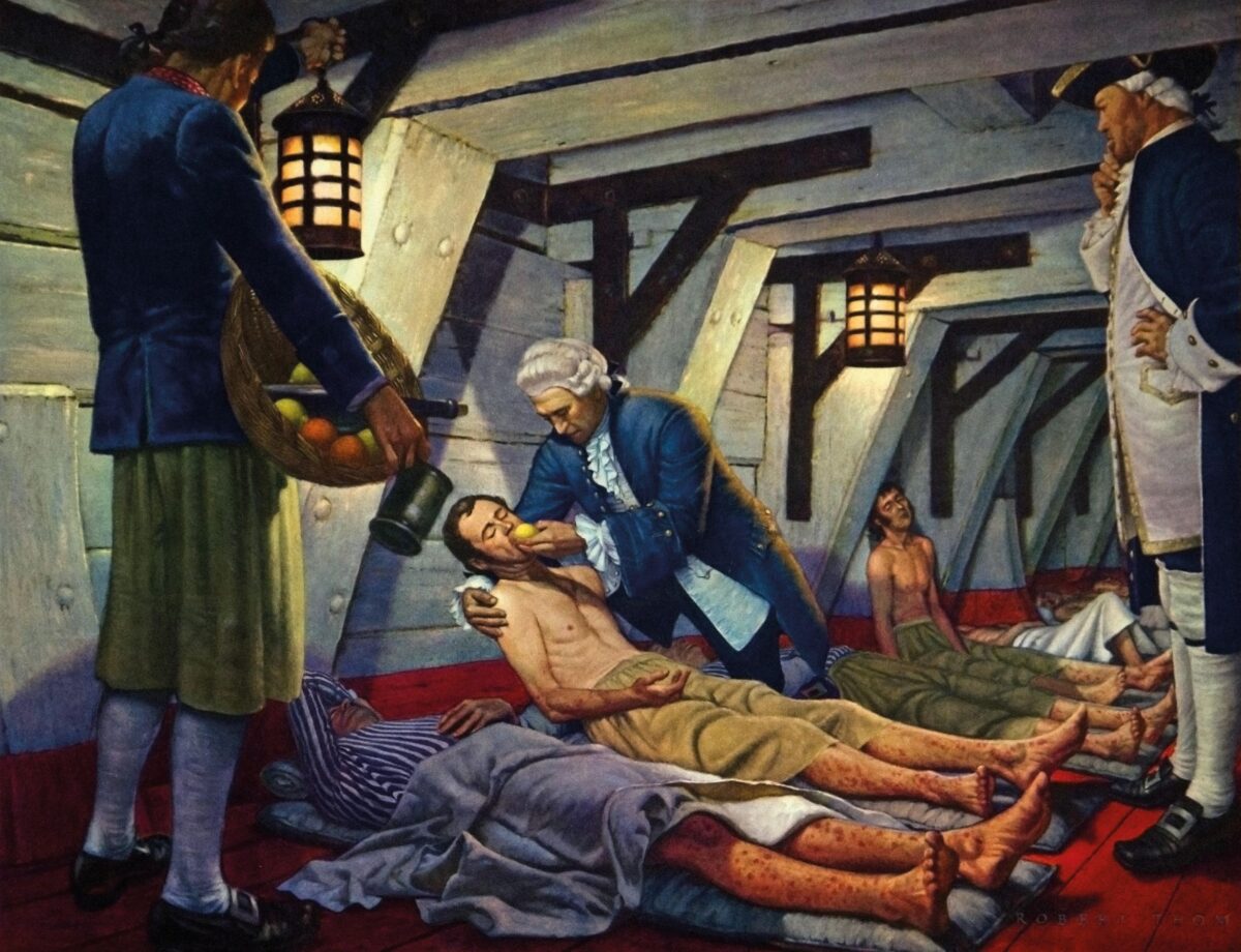 A 1950s illustration of Scottish physician James Lind feeding a sick sailor a piece of fruit