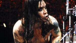 Ozzy Osbourne performs on stage