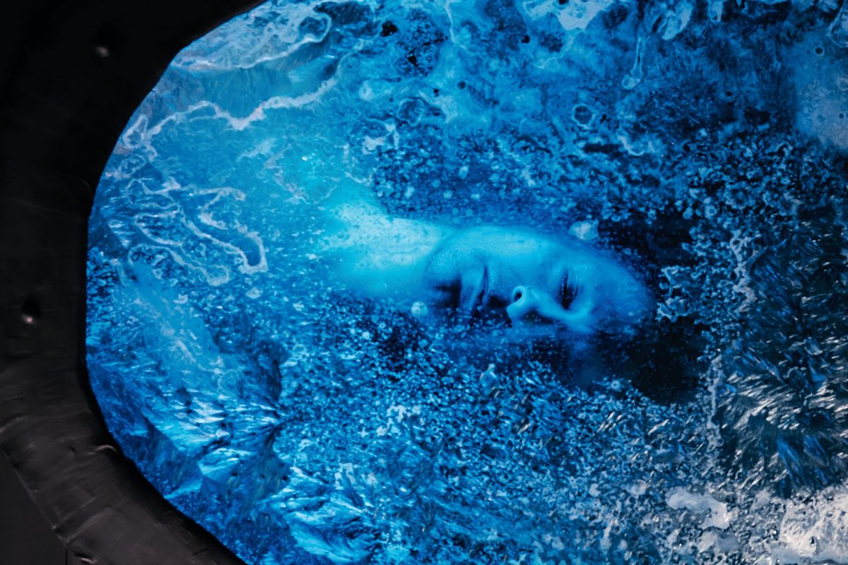 Artistic representation of a man in a cryonics chamber