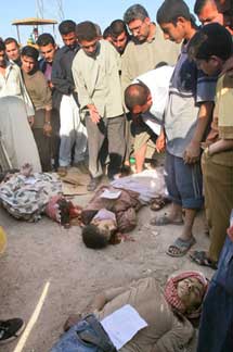 Victims of the Iraq conflict lie dead in the street