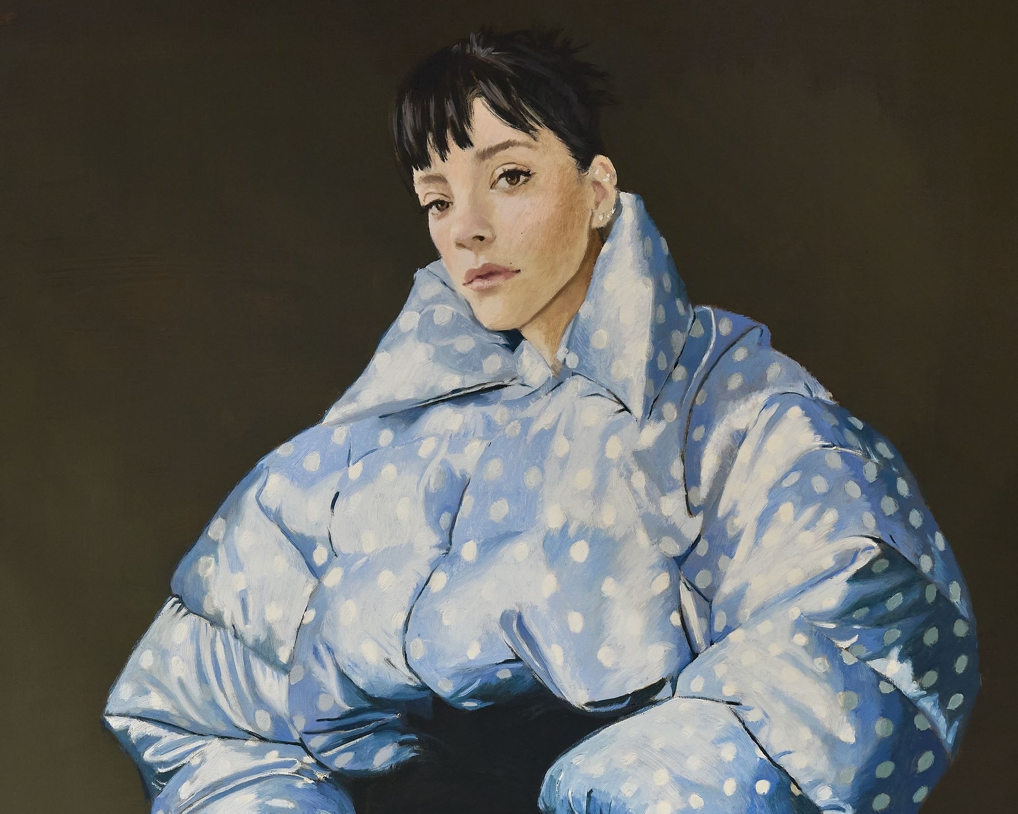 Album artwork from Lily Allen's 'West End Girl' shows a portrait of the singer wearing a blue polka dot puffer jacket