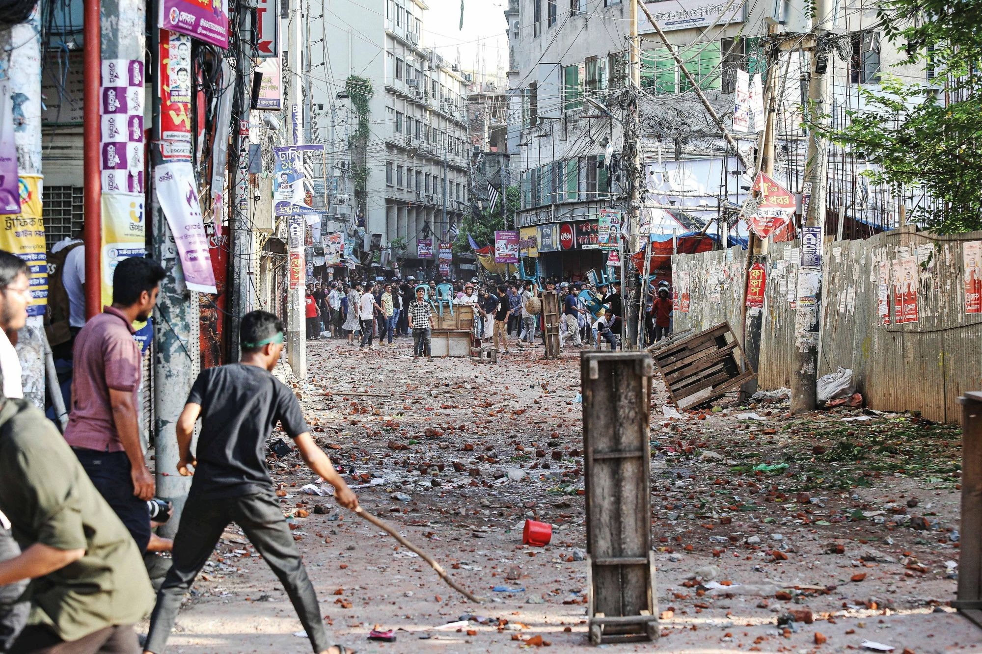 Protesters clash with supporters of the then government during nationwide protests in Bangladesh