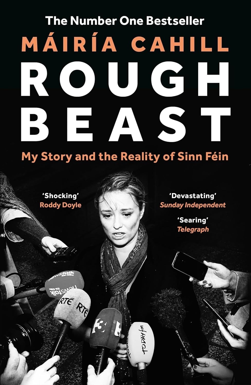 The cover of Cahill's book shows a woman surrounded by microphones