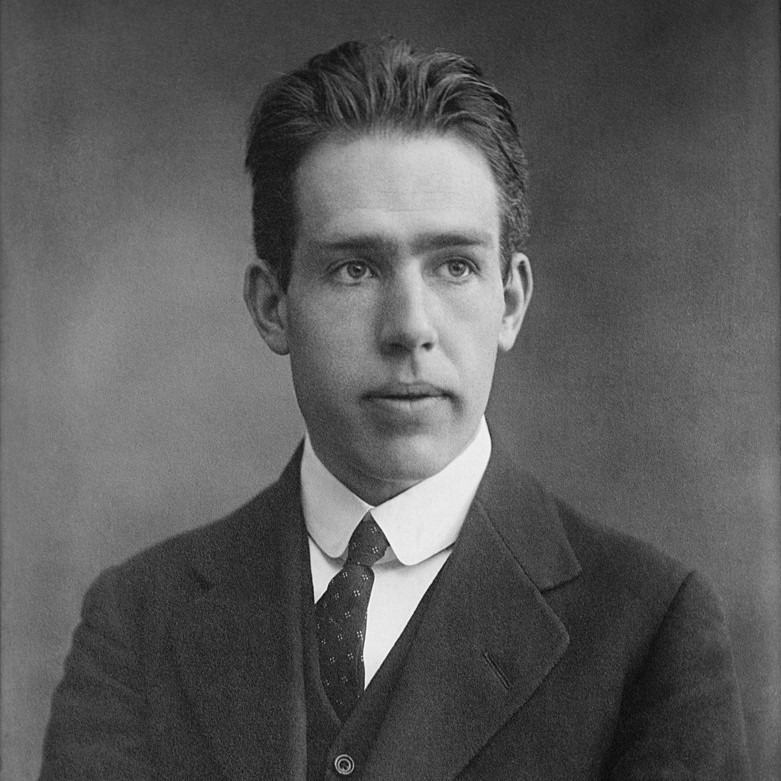 A black and white portrait photo of Bohr as a young man