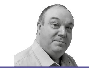 A headshot of David Whitehouse