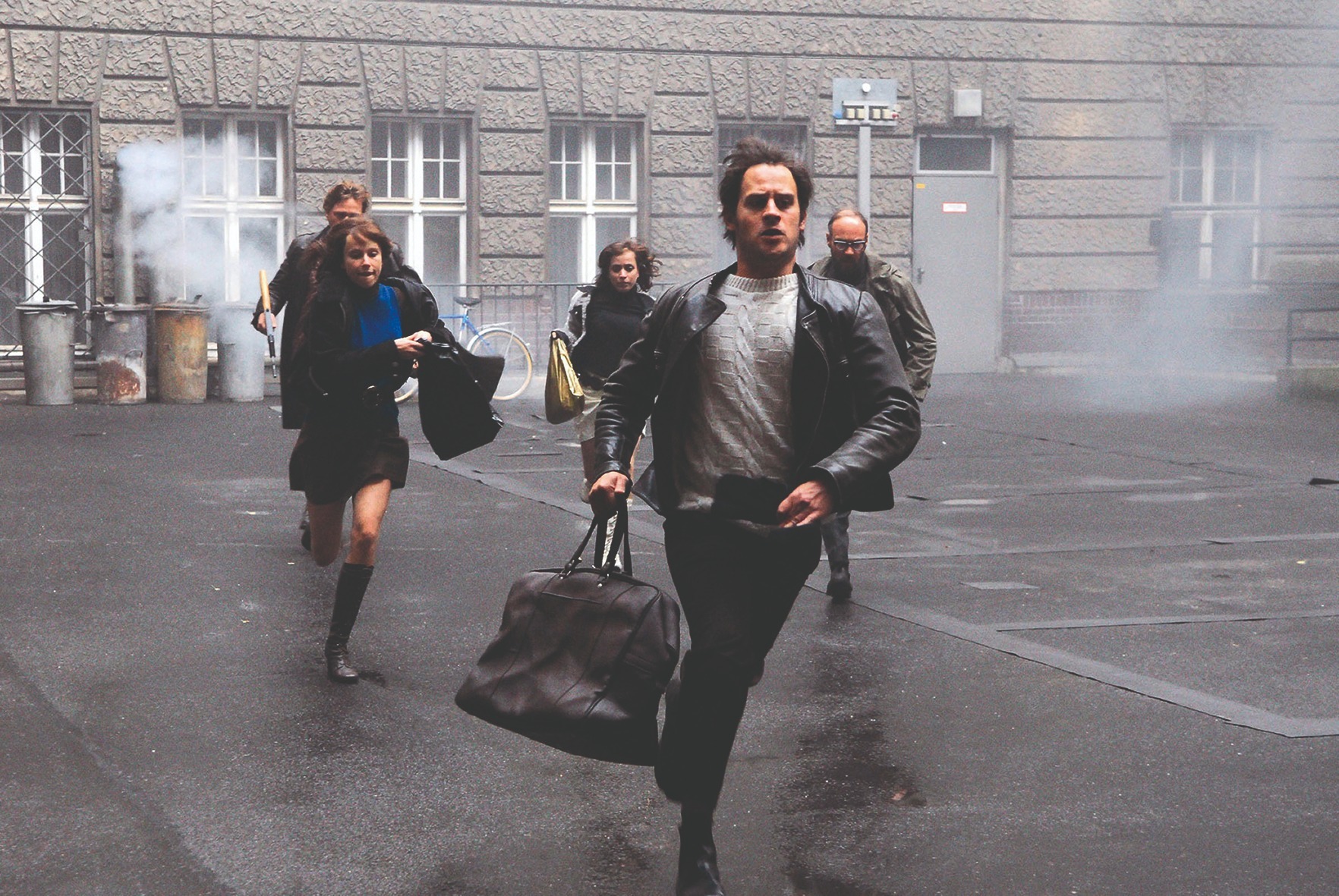 In a scene from the 2008 film “Der Baader Meinhof Complex”, a group of people run away from a building