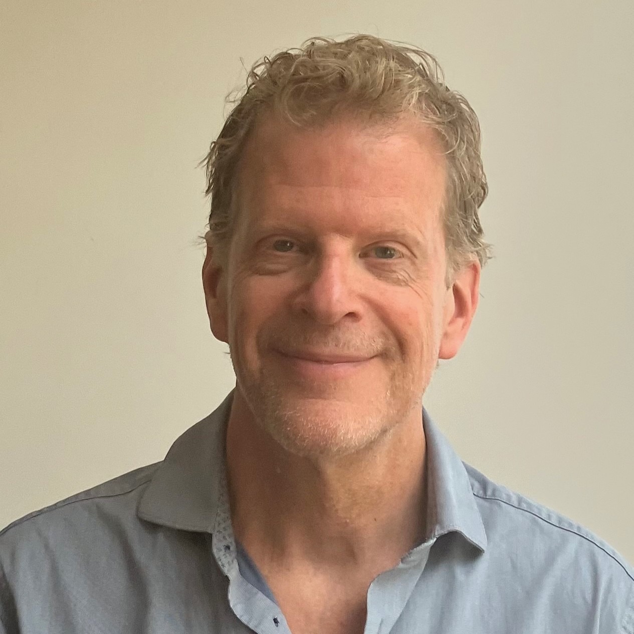 A headshot photo of Mark Hilborne