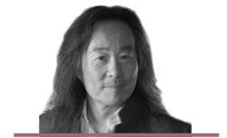 Yang Lian: A black and white headshot of the author
