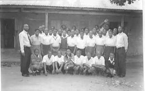 Mustard Seed School, a class and head teacher Moses Kamya