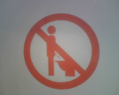German sign discouraging stand up peeing