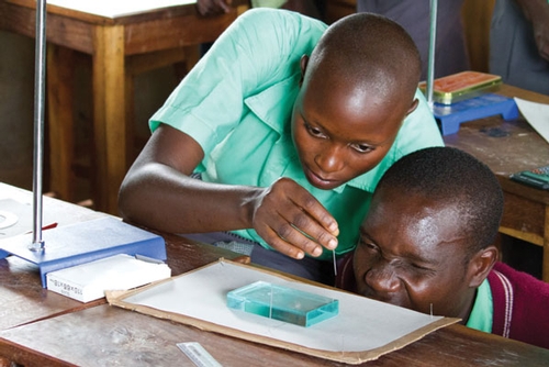 Pupils learning about refraction in a science lesson at Mustard Seed
