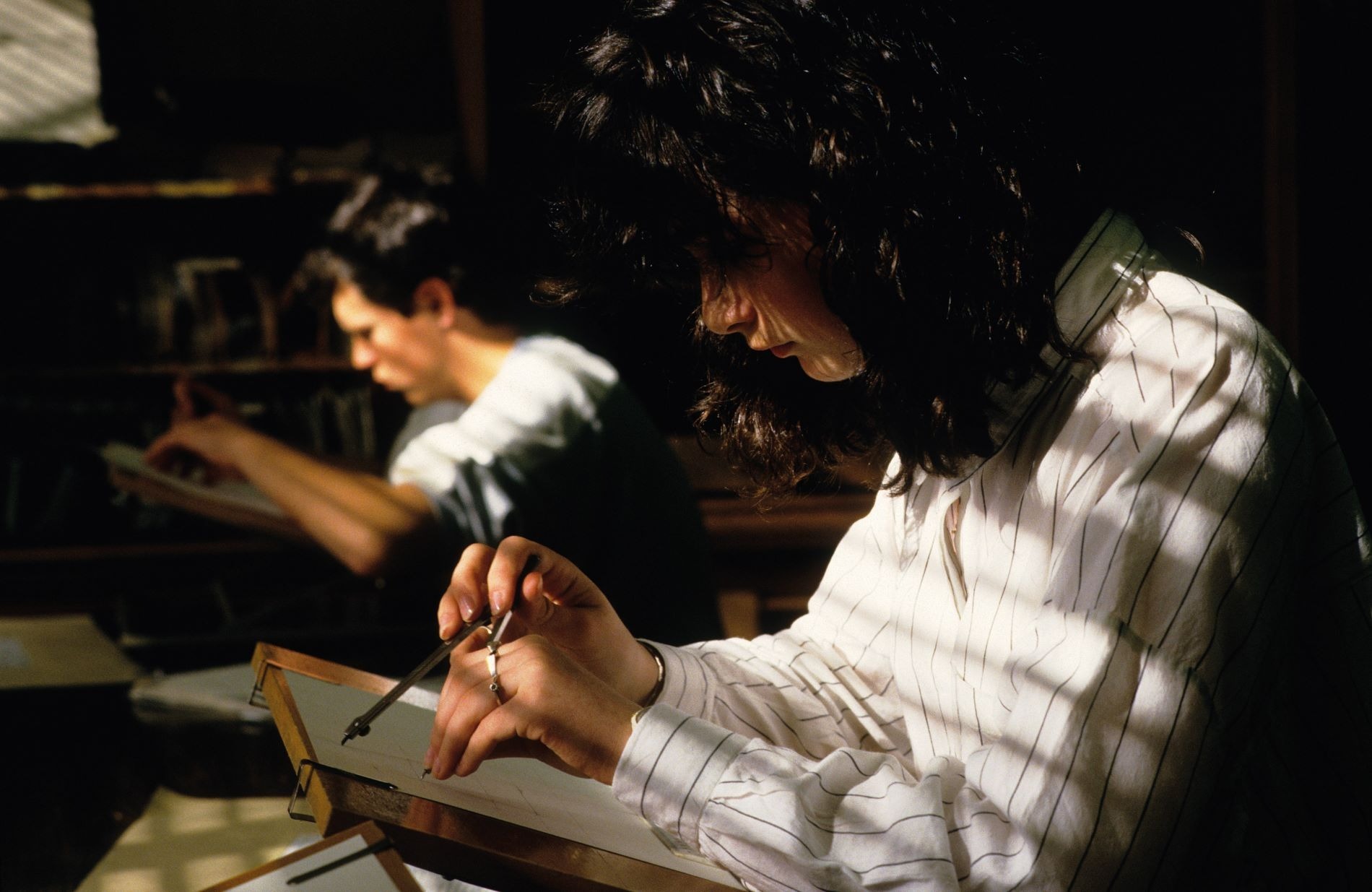 Two students studying at a desk