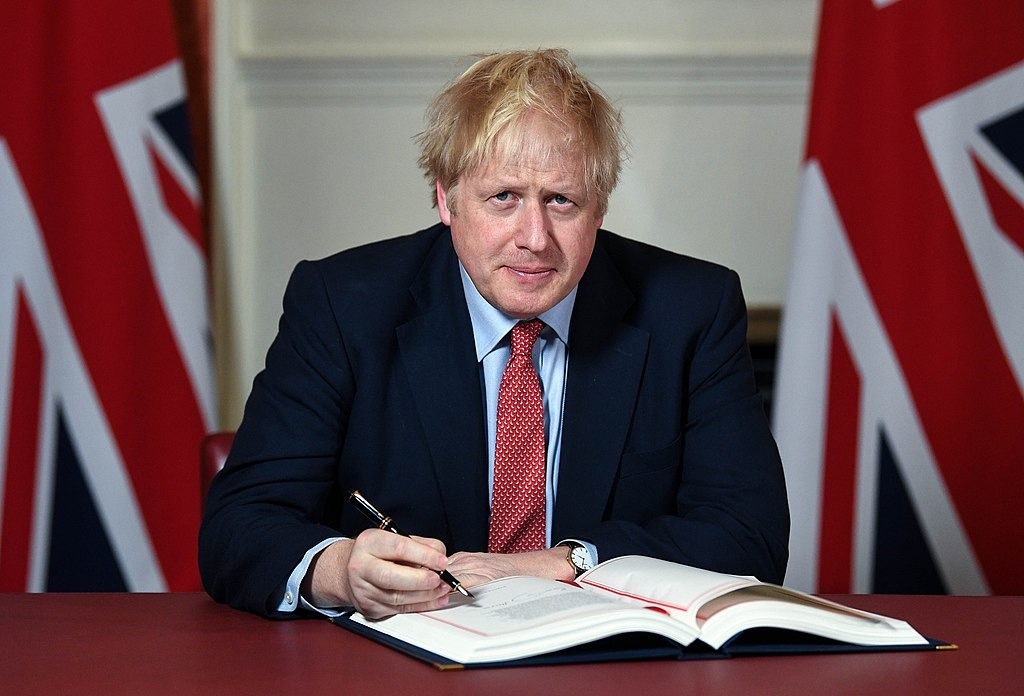Boris Johnson signs the Brexit Withdrawal Agreement
