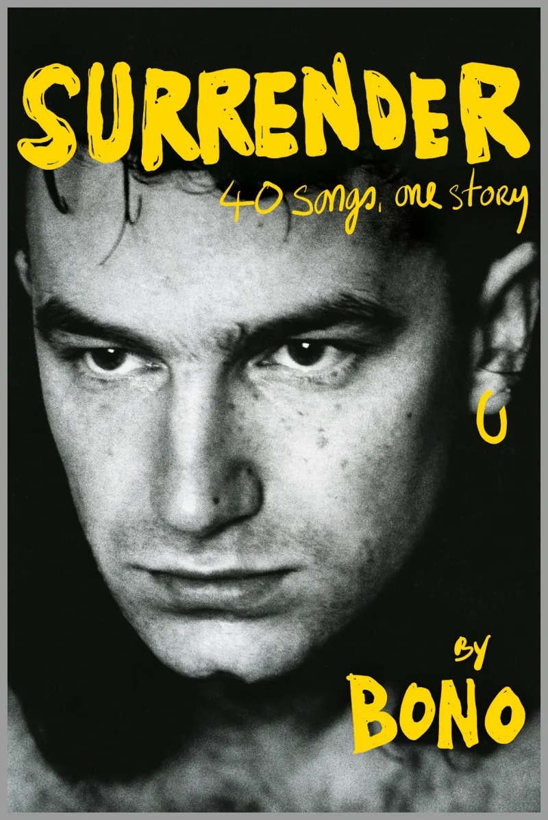 The cover art for 'Surrender' includes a black and white, close-up photo of Bono as a younger man