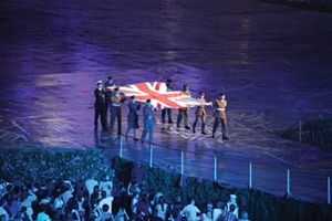 A British flag being carried at the 2012 Olympics opening ceremony.