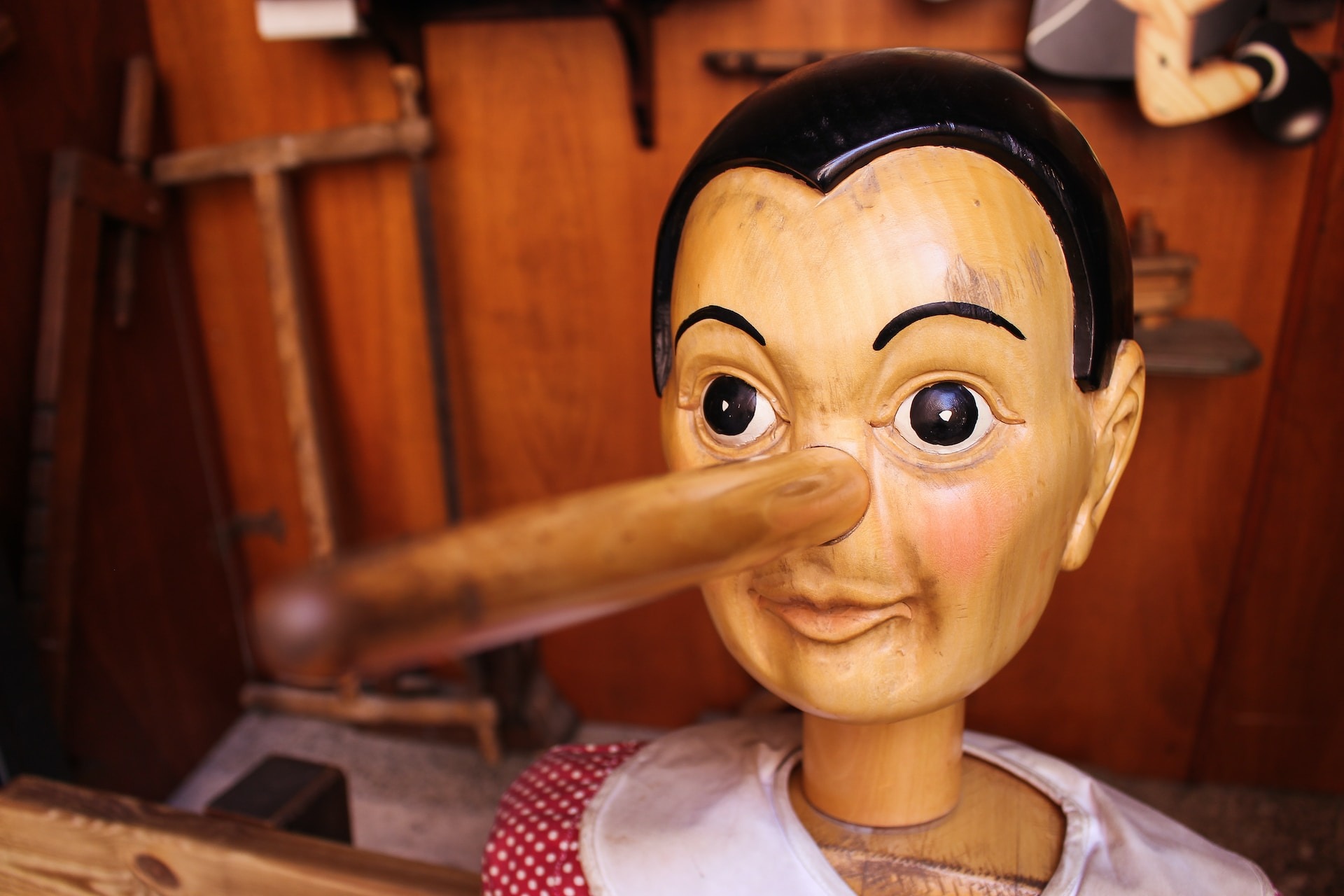 A wooden puppet of Pinocchio with a long nose