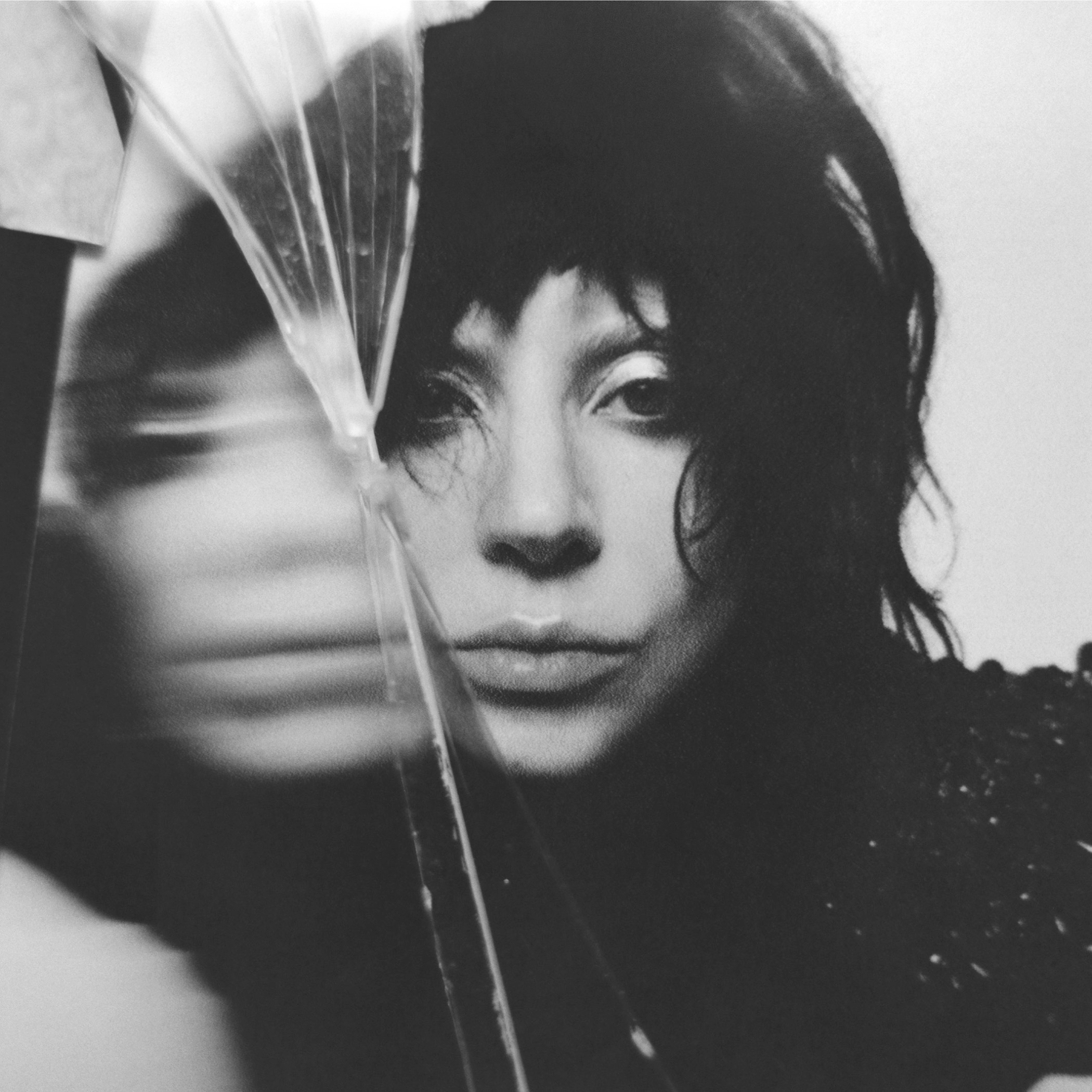 A distorted black and white photo of Lady Gaga