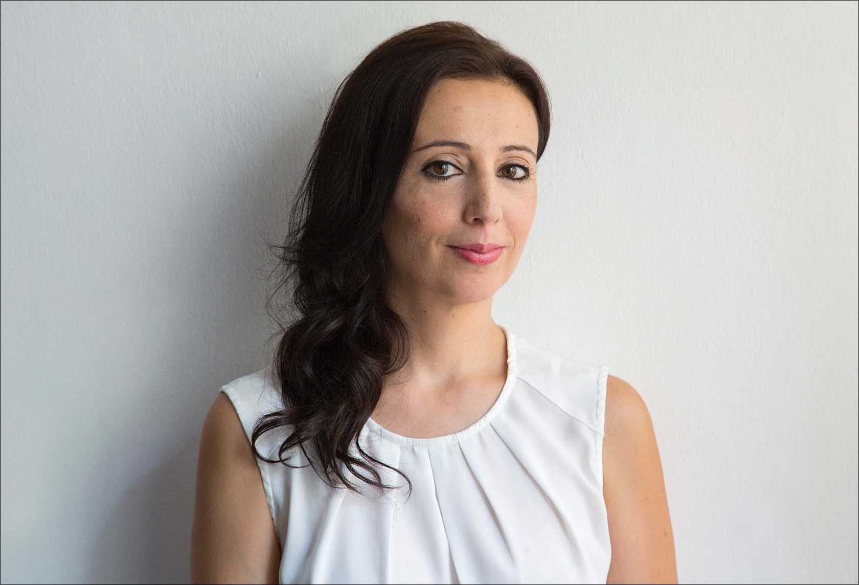 A portrait photograph of Rania Abouzeid