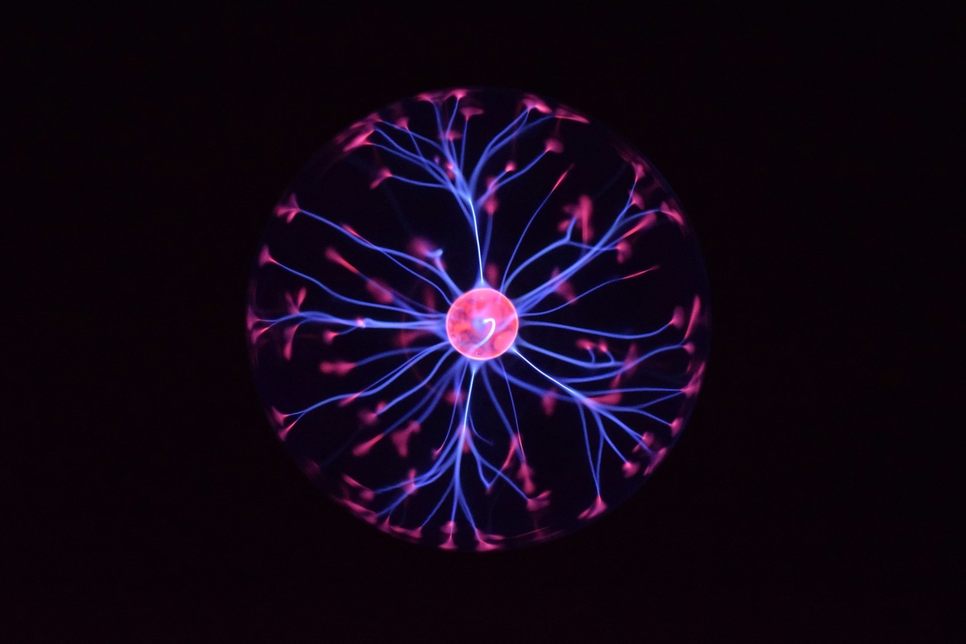 A pink and blue plasma ball
