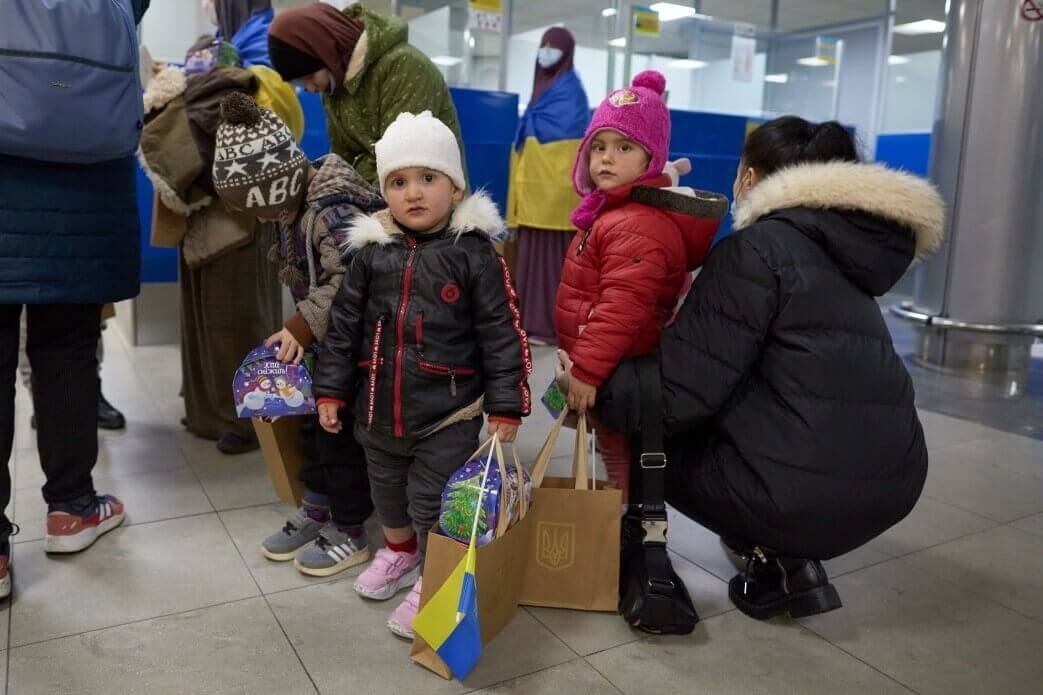 Ukrainian refugees at a checkpoint